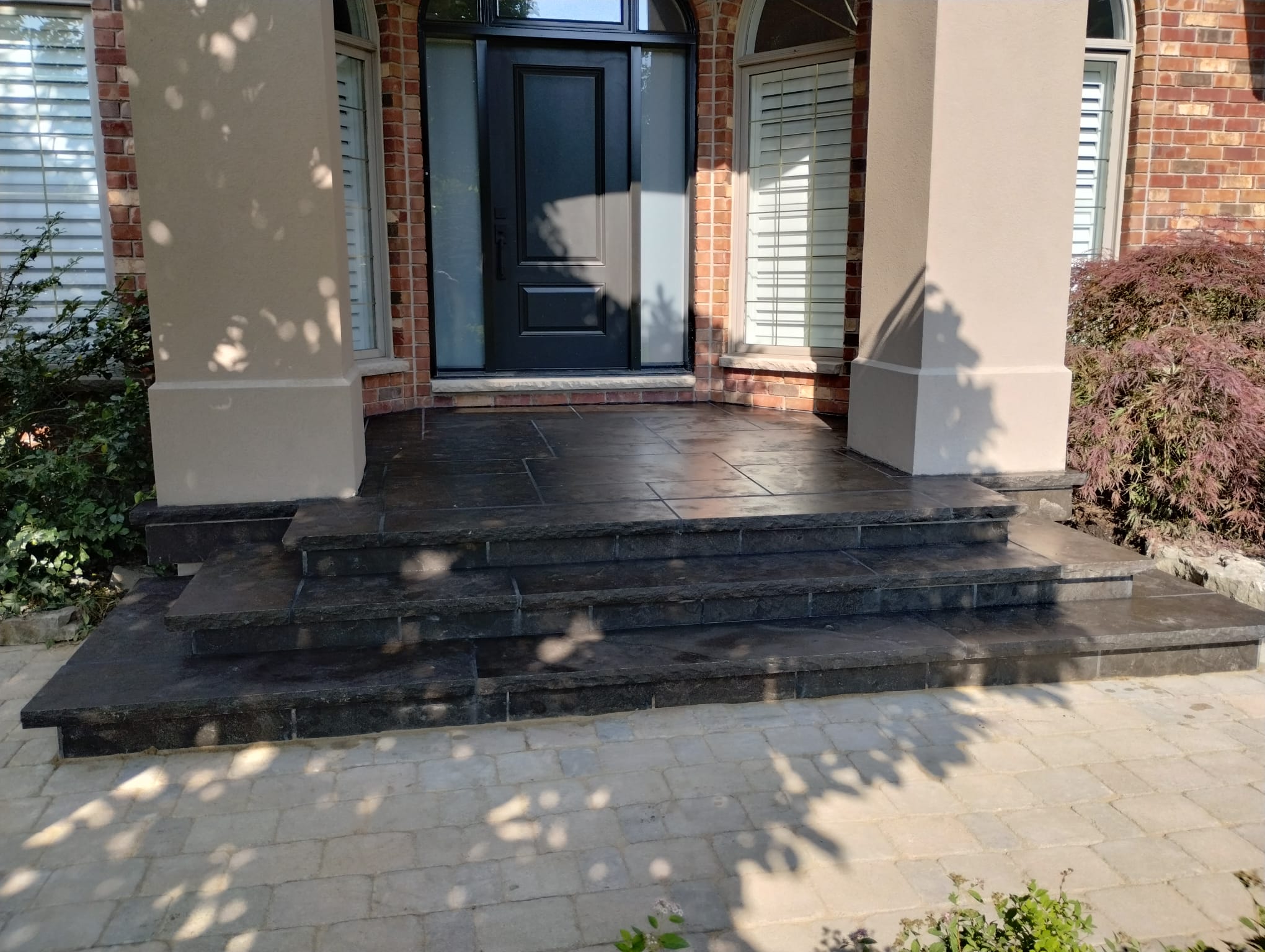 Unilock interlock stone patio project Seven Stones Landscape Golden Horseshoe